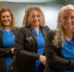 The smiling staff of the Ionia location for Oral Surgery Associates of Lansing